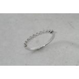 Diamond half eternity ring, round brilliant cut diamond collet set in 18ct white gold, ring size N