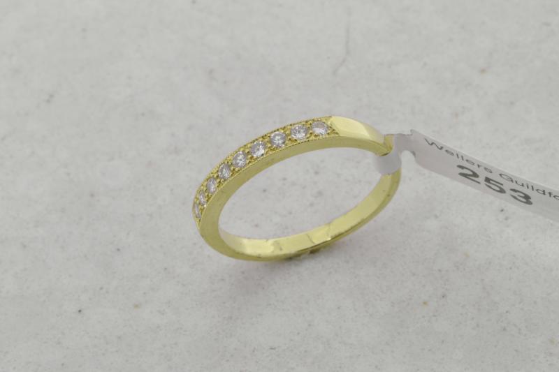 Diamond half eternity ring, nine round brilliant cut diamonds, mounted in 18ct yellow gold, ring