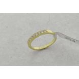 Diamond half eternity ring, nine round brilliant cut diamonds, mounted in 18ct yellow gold, ring