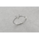 Diamond ring, one princess cut diamond with two modified princess cuts, set together in a heart