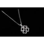 Diamond clover pendant, four leaf clover set with round brilliant cut diamonds, with a round cut