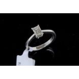 Single stone diamond ring, emerald cut diamond weighing an estimated 0.70ct, estimated colour and