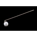 Pearl stick pin, round white pearl measuring approximately 6mm, mounted in 9ct yellow gold