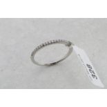 Diamond half eternity ring, round brilliant cut diamonds mounted in white metal, ring size L