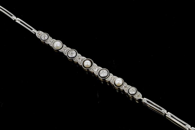 Edwardian old cut diamond and pearl bracelet, twelve old cut diamonds, estimated total diamond