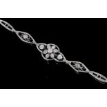 Victorian old cut diamond bracelet, central floral motif set with nine old cut diamonds, with
