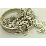 Selection of mainly silver items, including a silver engraved bangle and flat curb chain, and a