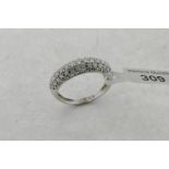 Diamond pavé set dress ring, three rows of round brilliant cut diamonds, with an estimated total