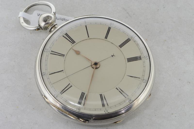 Victorian open faced silver pocket watch by John Johnson, circular dial with Roman numerals and