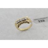 Diamond dress ring, five Swiss cut diamonds, set in central panel of shaped band, mounted in