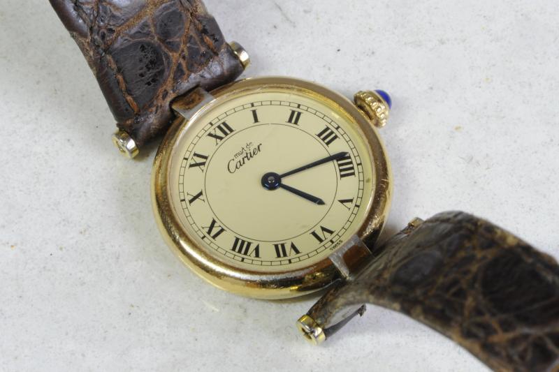 Ladies' Must de Cartier wristwatch, cream dial with Roman numerals, silver gilt case on a brown