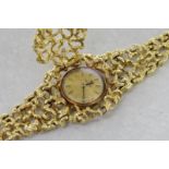 Ladies' Tissot wristwatch, circular gold coloured dial with baton hour markers, in a fancy yellow