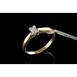 Single stone diamond ring, emerald cut diamond mounted in 18ct yellow gold, ring size N