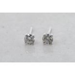 Single stone diamond stud earrings, round brilliant cut diamonds, estimated total diamond weight 0.