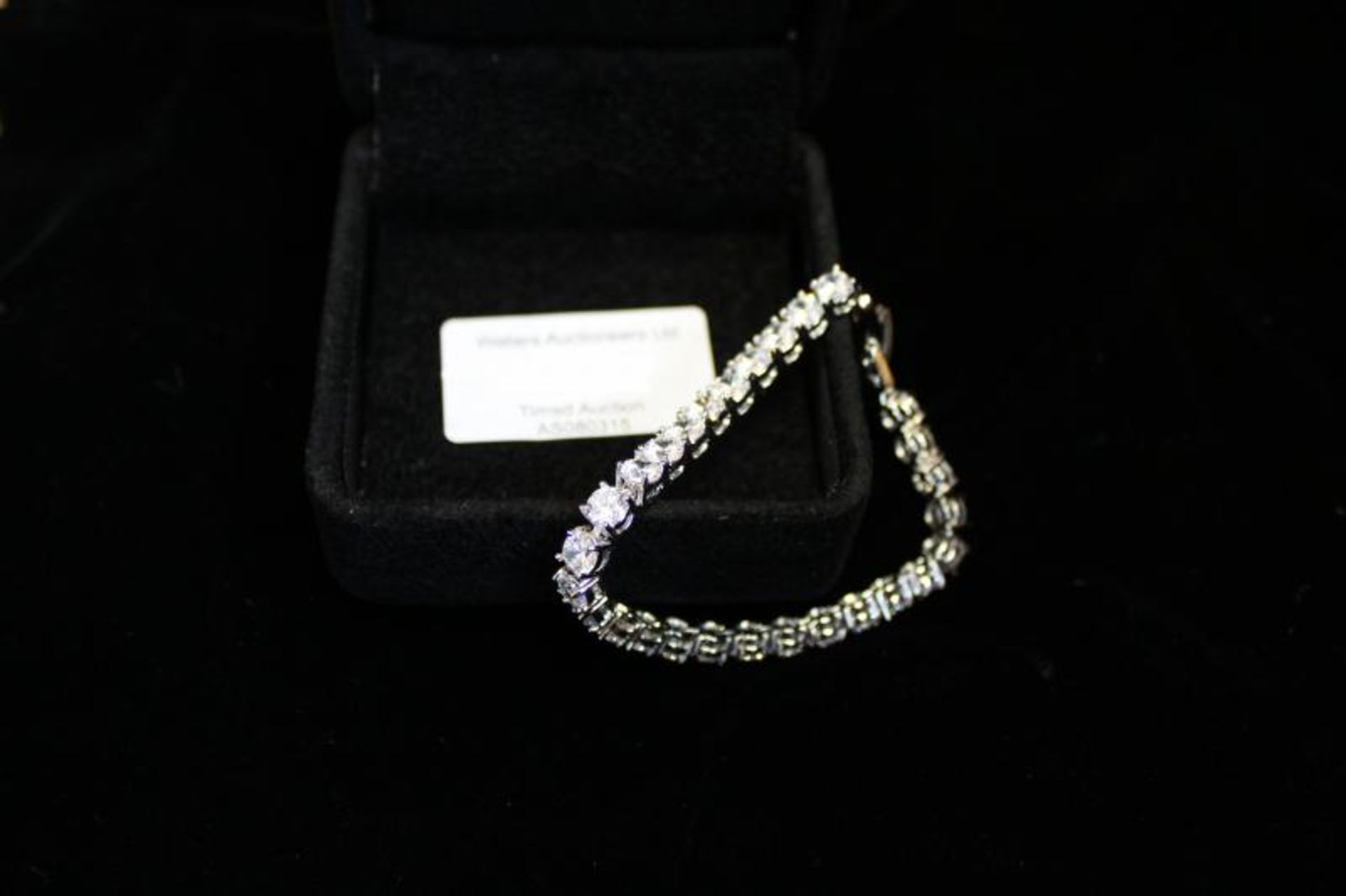 *Tennis bracelet, 18ct white gold plated set with cubic zirconia stones (Lot subject to VAT)