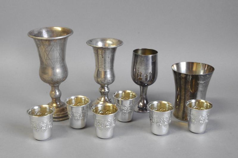 *Judaica - A set of six white metal kiddush cups, 62 grams, together with four further goblets,