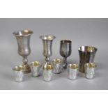 *Judaica - A set of six white metal kiddush cups, 62 grams, together with four further goblets,