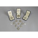 A collection of silver angling and football medals, gross weight approximately 118 grams