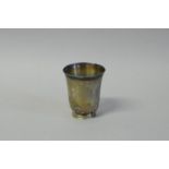 *A George Jensen silver trumpet shaped cup with stylized lotus flowers around the base, 7cm high,