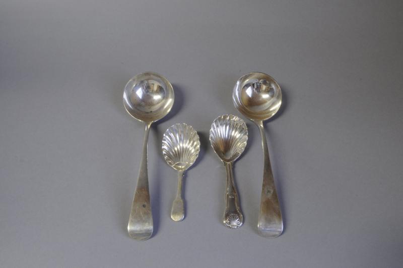 *A pair of George III silver ladles, London 1821 and two George III silver caddy spoons, London 1815