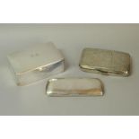 A German white metal glasses case stamped 800; a silver cigarre case with floral engraving,