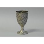*A Victorian silver beaker with trellis pattern, London 1862, gross weight approximately 98 grams (