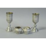 *Two Austro Hungarian white metal engraved goblets and cup holders, all with hallmarks for 800