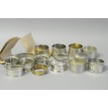 *A collection of silver napkin rings, various dates and markers, gross weight approximately 428