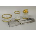 Parisienne gilt and glass table set comprising lighter, ashtray and pen holder, together with silver