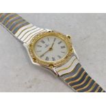 Ladies' Ebel bicolour wristwatch, white dial with Roman numerals, diamond set bezel, stainless steel