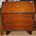 An Edwardian mahogany bureau with shell marquetry and boxwood and ebony stringing, with fall front