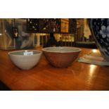 A set of two Studio pottery bowls with celadon glazed interiors with impressed Lowerdown pottery