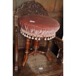 Victorian mahogany revolving music stool with plush pink upholstery