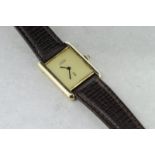 Must de Cartier manual wind wristwatch, plain dial with cabochon set crown, silver gilt case,