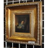 A gilt framed oil - Man with lantern