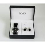 *Boss wristwatch, black circular dial with Roman numerals, on a black leather strap, together with a