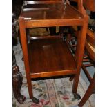 A mahogany tea trolley and a pair of Royal Holloway College cane seat chairs