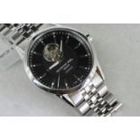 Gentlemen's Raymond Weil automatic wristwatch, black circular dial with baton hour markers,