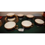 A set of six Minton teacups and saucers