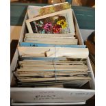 A shoebox collection of early 20th century post cards