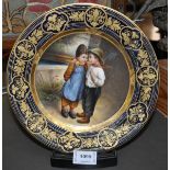 A Vienna cabinet plate, painted with a picture of two boys