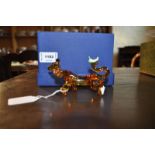 *A Swarovski amber glass model of Tigger, product code 9573933, in original box, 11cm h (Lot subject