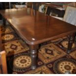 A Victorian mahogany extending dining table on turned supports, 240w x 120d x 72h