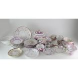 A large collection of early 19th century Lustreware, containing approximately 20 teacups and