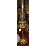 A Victorian copper and reeded brass column oil lamp 750h