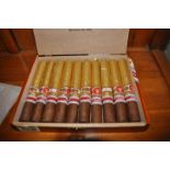 A box of ten Punch Medalla de Oro Cuban cigars, dated May 12, the box's seal is broken but cigars as