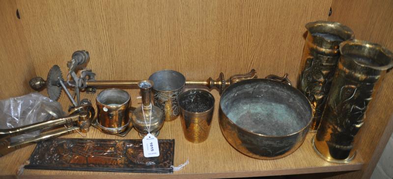 Four copper door finger plates, a brass door knocker, two brass trench art vases dated 1916 and a
