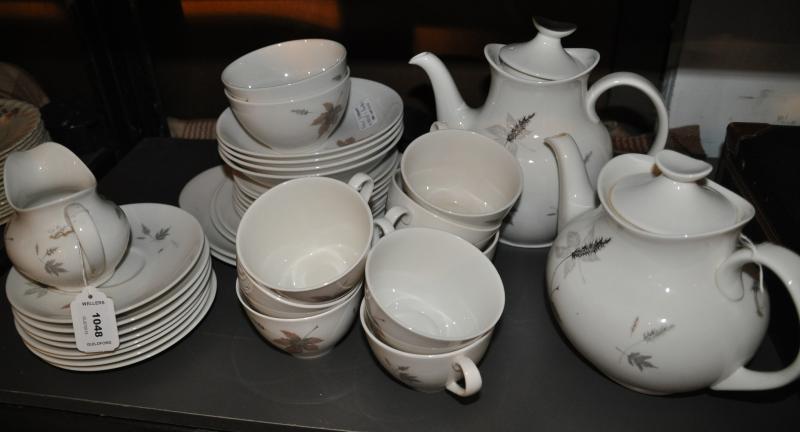 A Royal Doulton eight piece tumbling leaves teaset