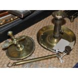 *Two Victorian brass candlesticks and a brass 8lb fishermans scale (Lot subject to VAT)