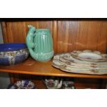 A Sylvac squirrel vase no. 1115, a blue glazed stoneware bowl and a set of four Crown Ducal plates